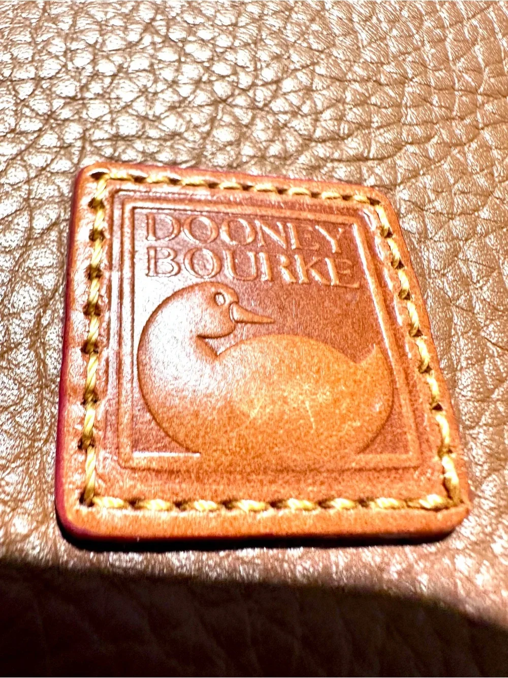 Dooney & Bourke Brown Pebbled Leather Wristlet with Tan Trim